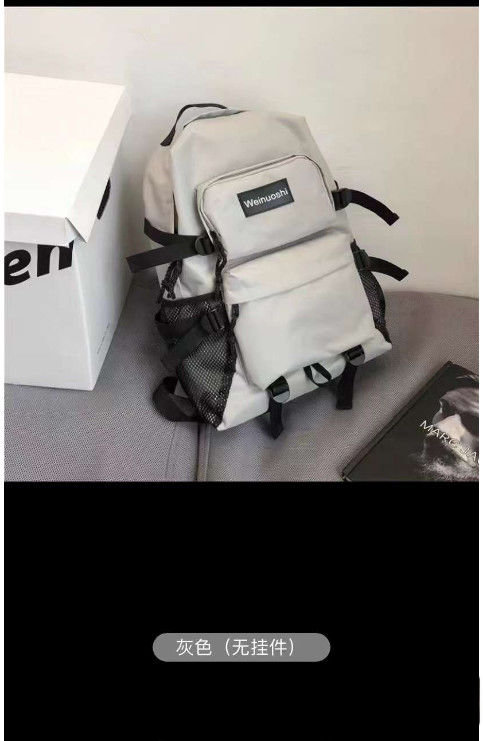 Gepersonaliseerd logo schooltas Man en Vrouw Studenten Grote capaciteit Mode Trend Rugzak Eenvoudige rugzak Vrouwelijke